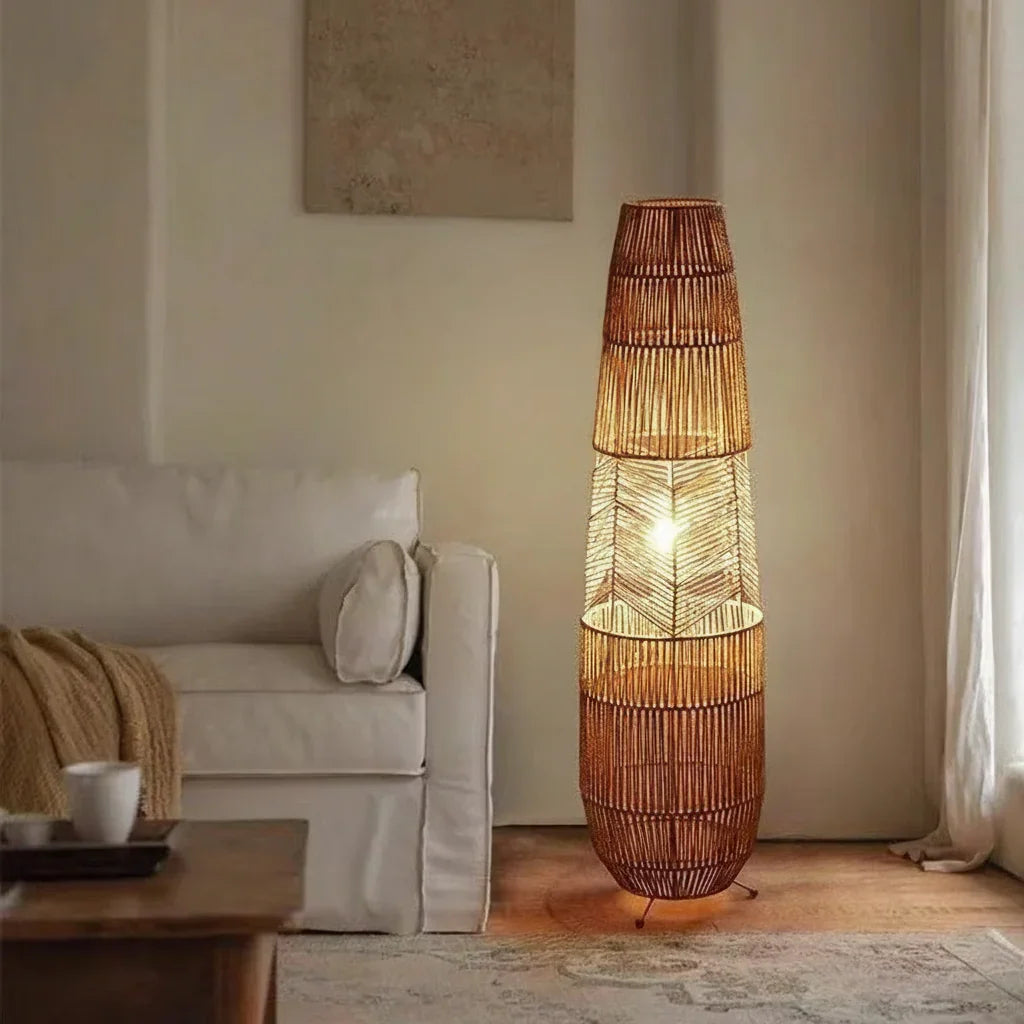Modern living room with woven rattan floor lamp and white sofa